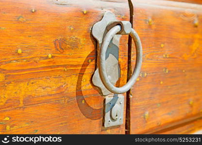 europe old in italy antique close brown door and rusty lock closeup