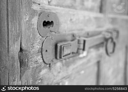 europe old in italy antique close brown door and rusty lock closeup