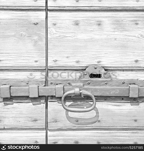 europe old in italy antique close brown door and rusty lock closeup