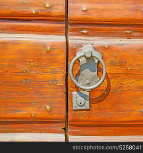 europe old in italy antique close brown door and rusty lock closeup