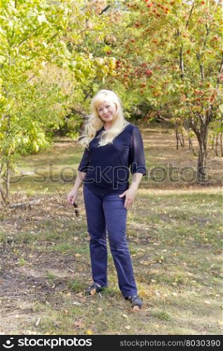 European blond woman with long hair in autumn