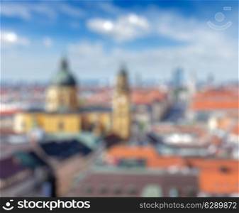 European city blurred defocused background - Munich over Theatine Church of St. Cajetan Theatinerkirche St. Kajetan and Odeonplatz, Munich, Bavaria, Germany