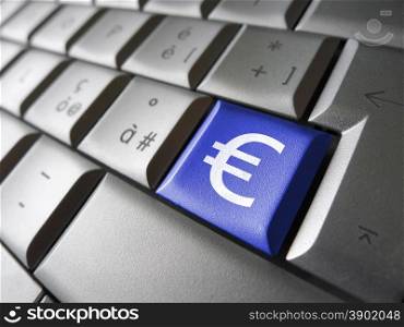 European Union financial concept image with euro symbol, sign and icon on a blue laptop computer key for blog, website and online business.