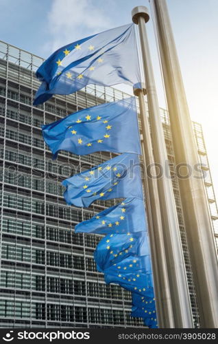 European Union flags in front of the Berlaymont building (European commission) in Brussels, Belgium.