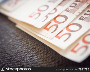 Euros with dark background. Concepts for money