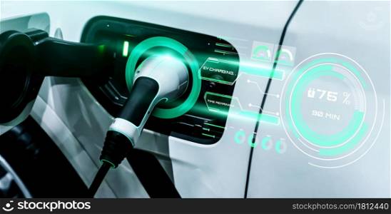 EV charging station for electric car in concept of alternative green energy produced from sustainable resources to supply to charger station in order to reduce CO2 emission .. EV charging station for electric car in concept of alternative green energy