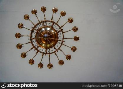 Evangelic Lutheran Church in Koknese, Latvia. Interior of Koknese church. Chandelier at the ceiling in the Evangelical Lutheran Church of Koknese. Church was built in 1687. 