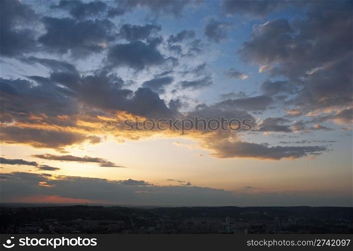 Evening blue sky with clouds and Lviv City view