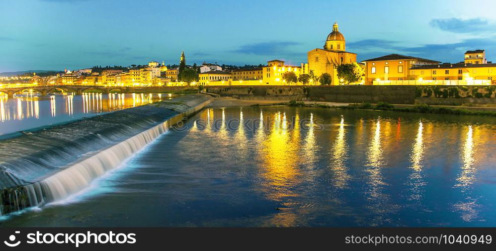 Evening mood on the weir Pescaia di Santa Rosa Arno in Florence Tuscany Italy