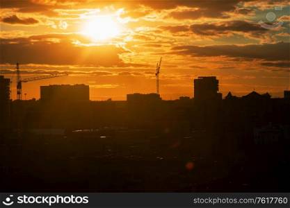 Evening photo of city, beauty summer sunset. Evening photo of city