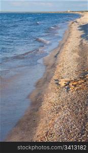 Evening summer sandy sea beach (Crimea, Ukraine)