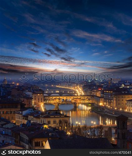 Evening twilight sky with clouds above Florence, Italy, Tuscany. City top view and bridges across Arno river.