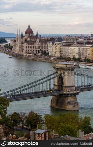 Evening view of river danube, chain bridge and Hungarian Parliament Building, Budapest, Hungary, portrait.