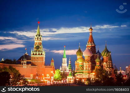 Evening view of the Moscow City from Zaryadye Park. Beautiful cityscape view of Moscow city during sunset with Kremlin and St Basils Church in Moscow. Panoramic view of Moscow landmark during sunset from Zaryadye Park