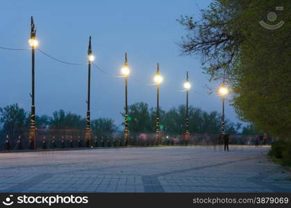 Evening view of the waterfront mall Krasnoarmeysk district of Volgograd in the first lock of the Volga-Don Canal. Evening view of the alley