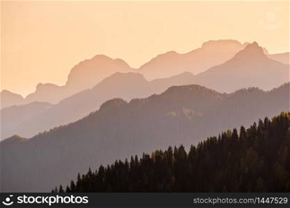 EveningDolomite mountain tops silhouettes peaceful view from Giau Pass. Climate, environment and and travel concept scene.