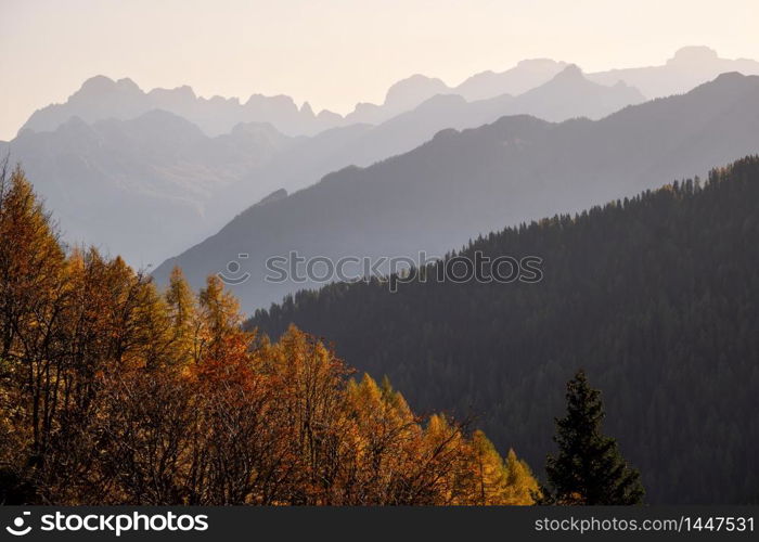 EveningDolomite mountain tops silhouettes peaceful view from Giau Pass. Climate, environment and and travel concept scene.