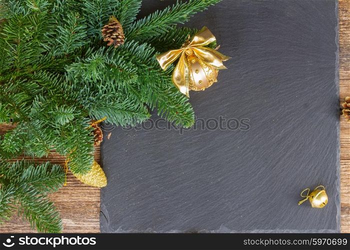 evergreen tree with golden ball. evergreen fir tree with golden ball christmas frame on black background