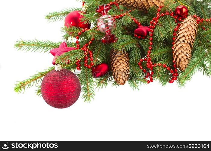 evergreen tree with red christmas decorations and cones. evergreen tree and red christmas decorations with pine cones on white background