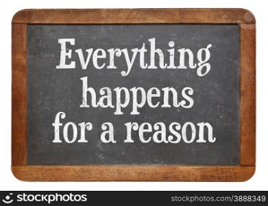 Everything happens for a reason - text on a vintage slate blackboard