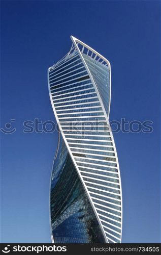 Evolution Tower of Moscow International Business Center (Moscow-City) on blue sky background, Moscow, Russia