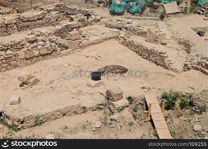 Excavation at archaeological site in Athens, Greece. Ruins of an ancient structure.