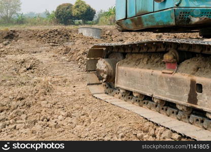 excavator backhoe digger tractor at construction site