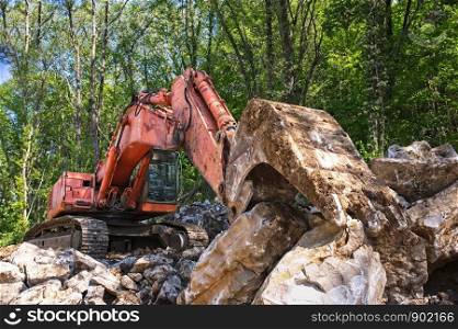 Excavator loader machine at road construction site