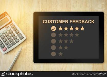 excellent five stars customer feedback on tablet with soft light vintage effect
