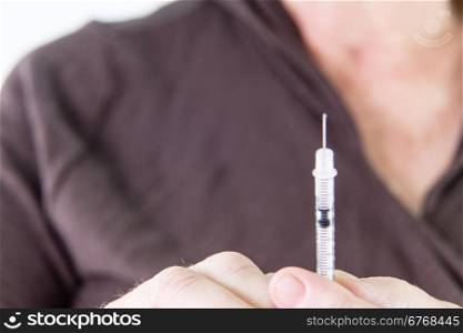 Excess insulin squirted out of syringe