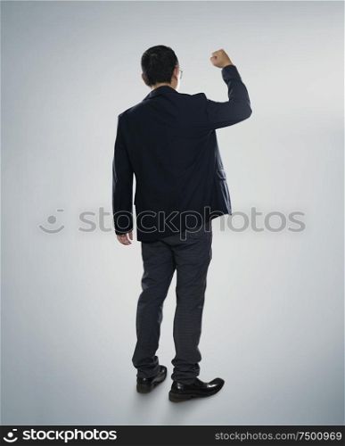 Excited businessman isolated on the white
