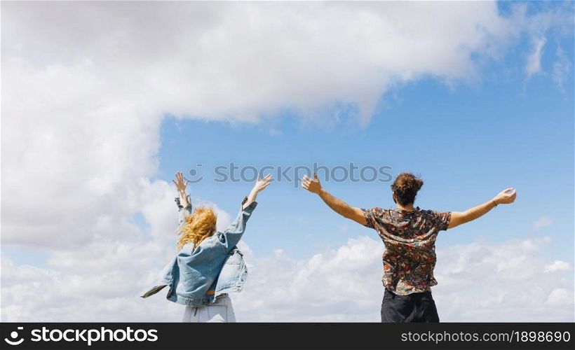 excited couple with hands up. Resolution and high quality beautiful photo. excited couple with hands up. High quality beautiful photo concept