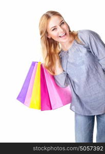 Excited shopper, cheerful girl holding in hand colorful gift bags isolated on white background, hobby of spending money, sales concept