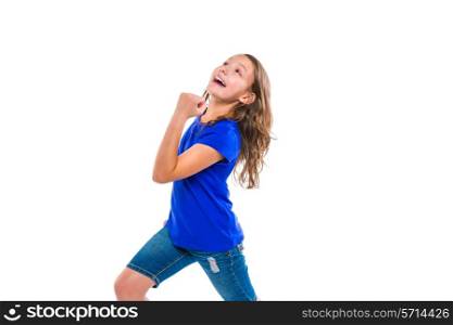 Excited winner expression kid girl gesture running with blue jeans on white background