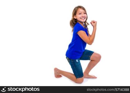 Excited winner expression kid girl hands gesture blue jeans on white background