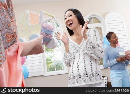 Excited Woman at Her Baby Shower half length