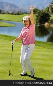 Excited Woman on Putting Green
