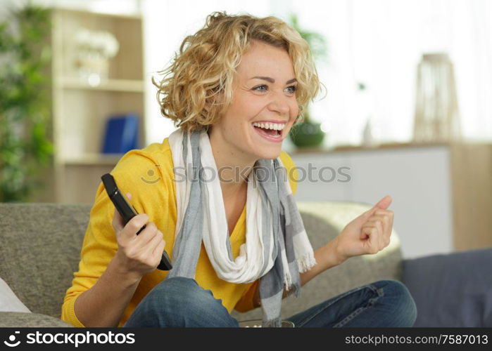 excited woman winning online prize