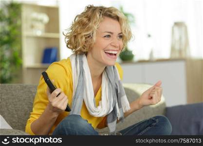 excited woman winning online prize