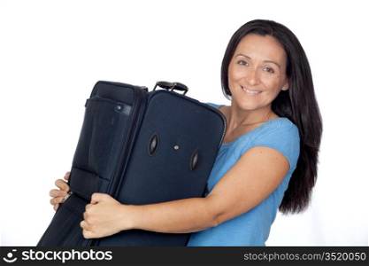 Excited woman with a heavy suitcase isolated on white background
