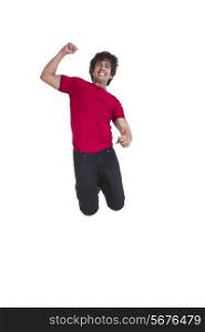 Excited young man jumping isolated over white background
