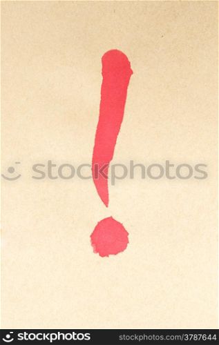 Exclamation mark symbol written on brown paper