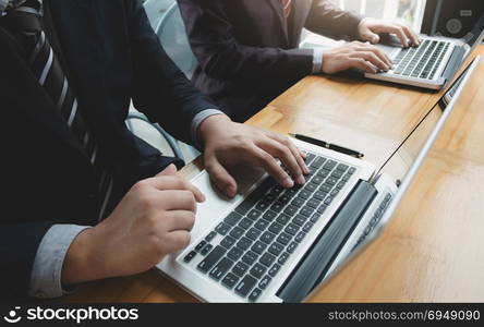 executive financial auditor team analyzing investment charts with laptop and calculator