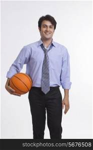 Executive holding basketball