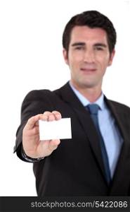 Executive proffering his businesscard