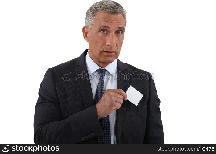 Executive pulling businesscard from pocket