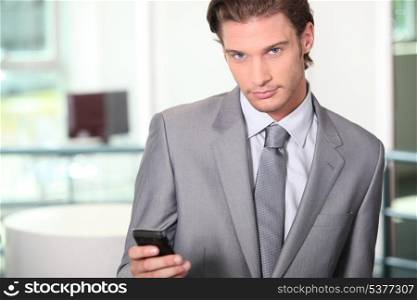 Executive using a cell phone