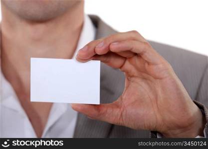 Executive with a blank business card