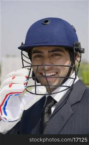 Executive with a cricket helmet
