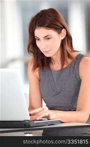 Executive woman working on laptop computer